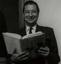 A person holding a book  Description automatically generated with medium confidence