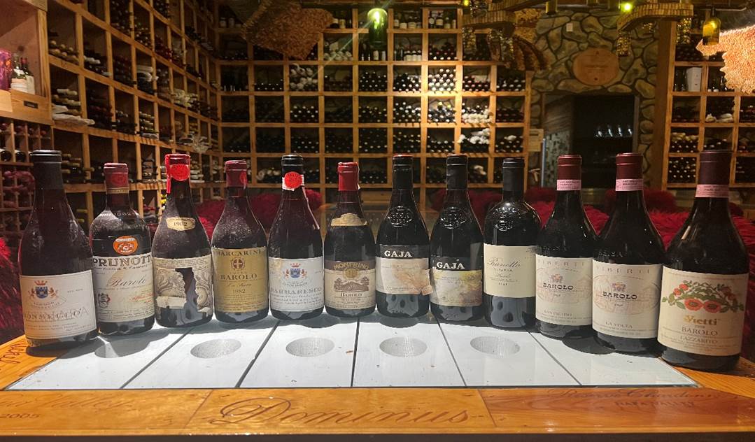 A group of bottles on a counter  Description automatically generated with medium confidence