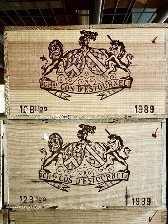 A wooden boxes with logos  Description automatically generated with medium confidence