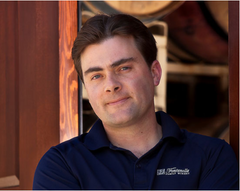 A person in a blue shirt  Description automatically generated with medium confidence