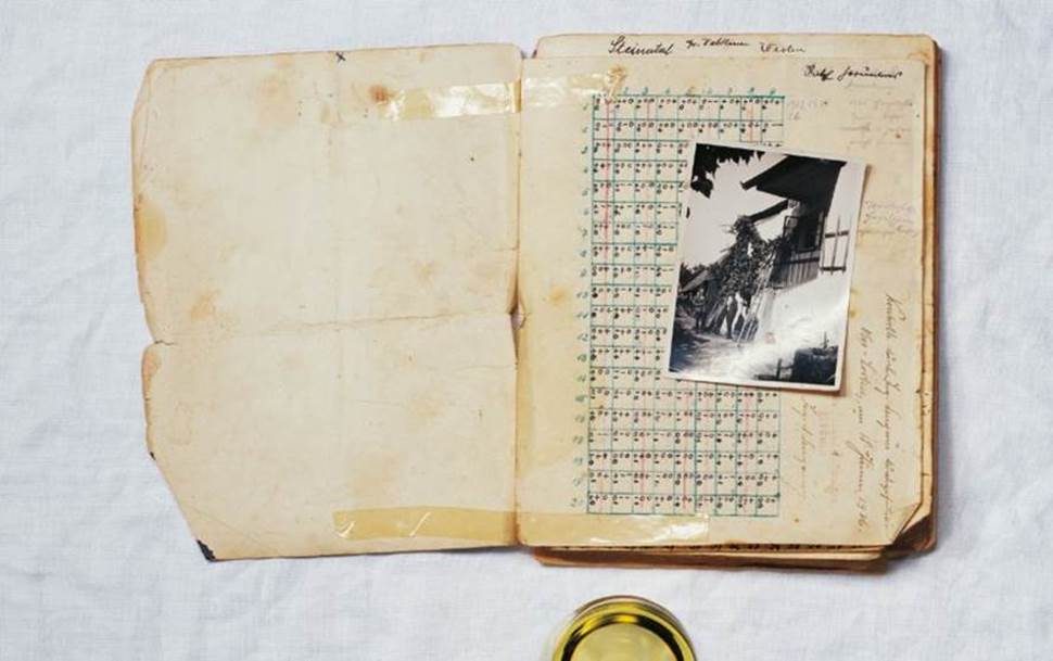 A picture containing letter, book, stationary  Description automatically generated