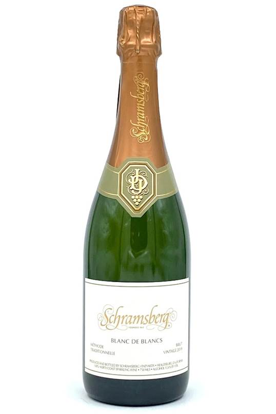 A bottle of champagne  Description automatically generated with low confidence