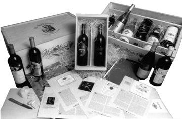Several bottles of wine in a box Description automatically generated