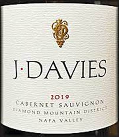 A picture containing text, alcohol, beverage, vessel  Description automatically generated